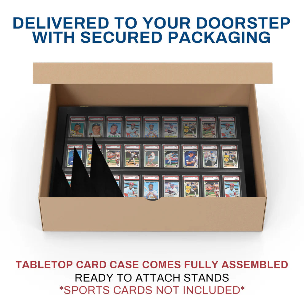 Open cardboard box containing a tabletop card slab case with pre-assembled stands, on a white background.
