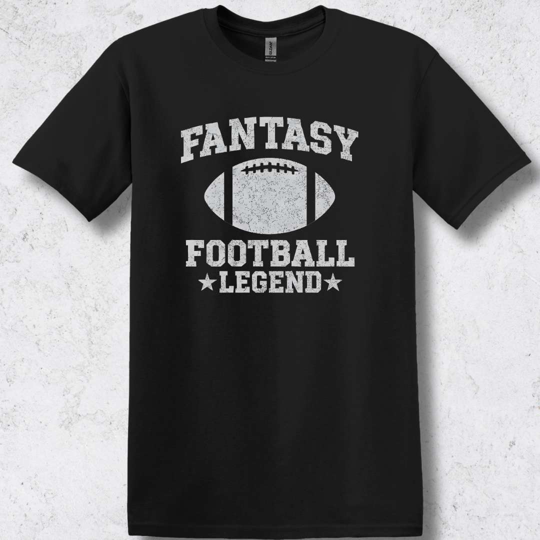 Black t-shirt with 'Fantasy Football Legend' text and football graphic on a textured white background