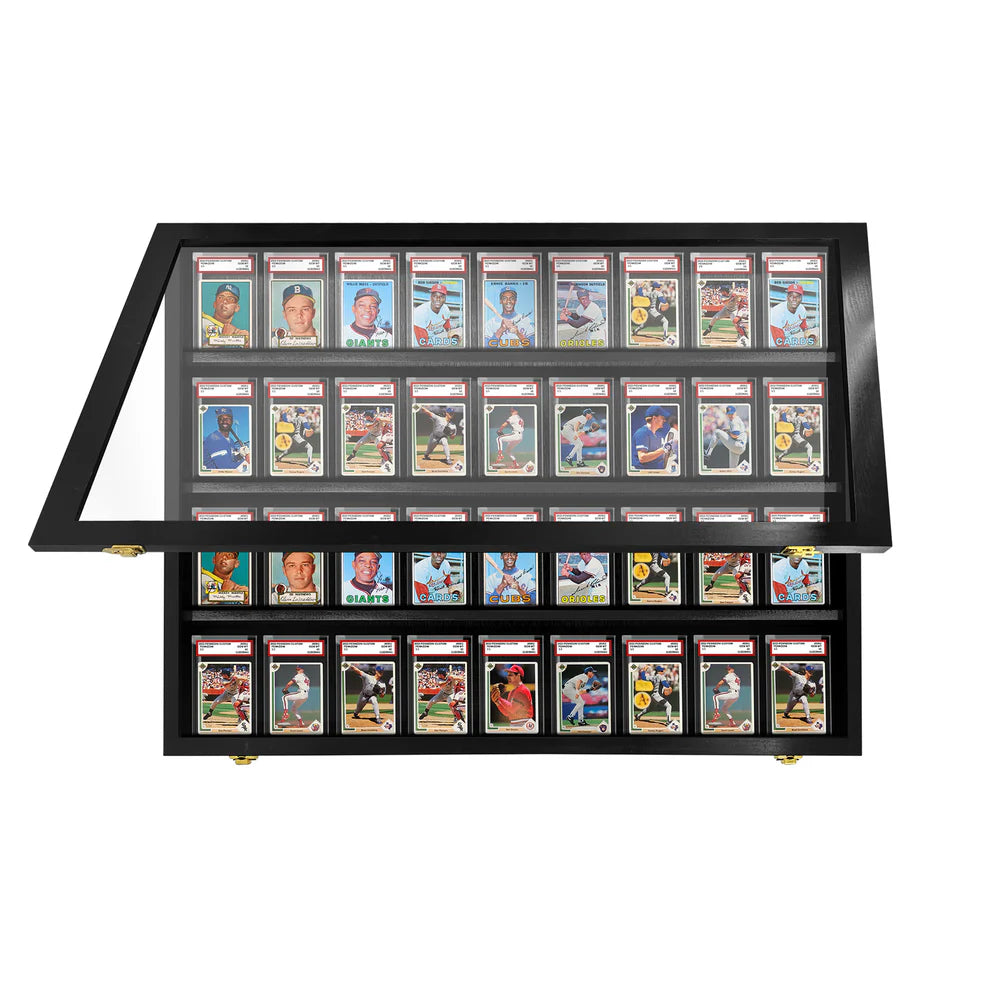 Collection of sports trading cards in a display case on a white background