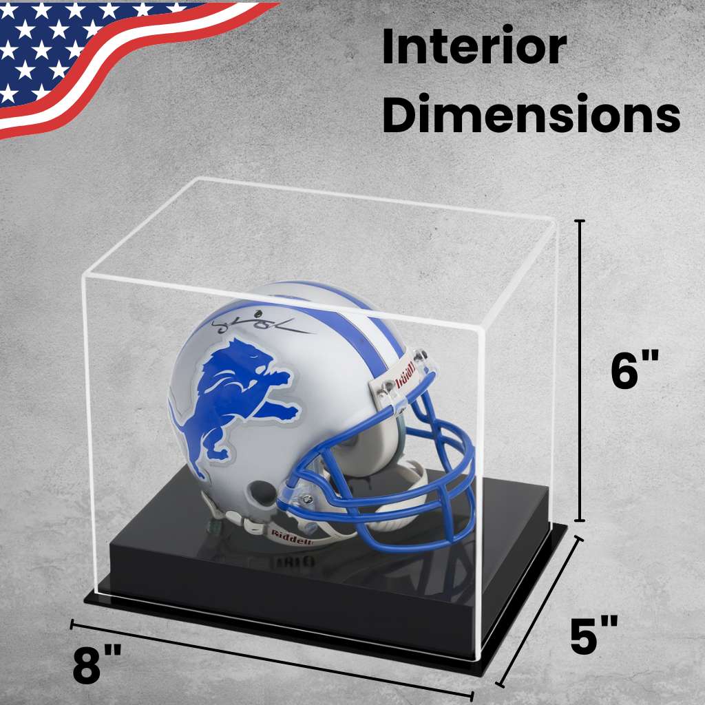 Miniature football helmet in a clear display case with dimensions on a gray background.