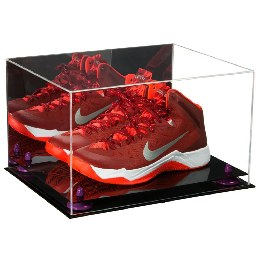 Red Nike basketball shoes in a clear display case on a white background