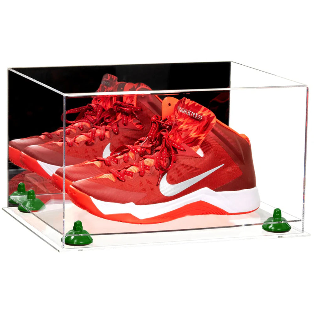Red Nike basketball shoes in a clear display case on a white background