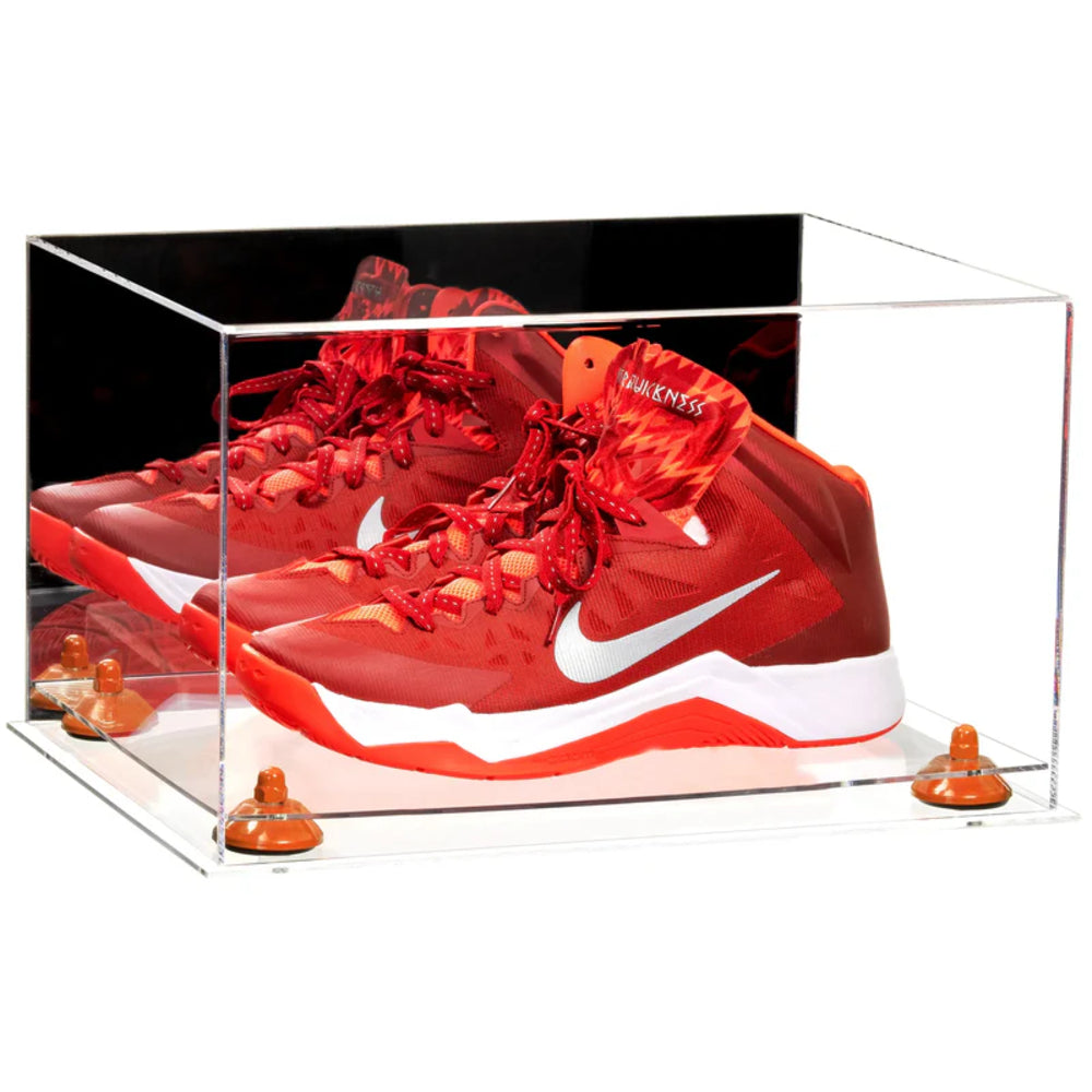 Red sneakers with a white logo in a clear display case on a white background