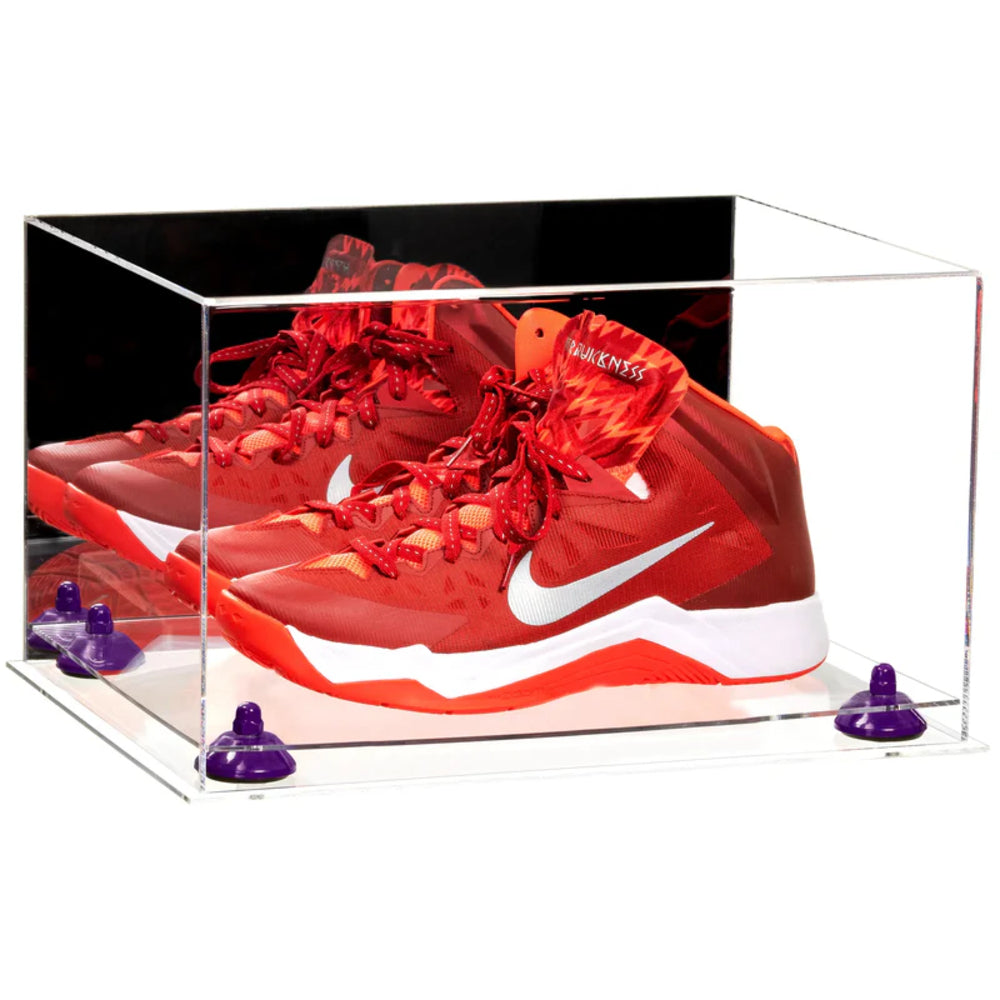 Red sneakers with a white logo in a clear display case on a white background
