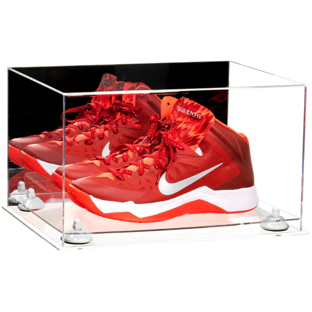 Red sneakers with a white logo in a clear display case on a white background