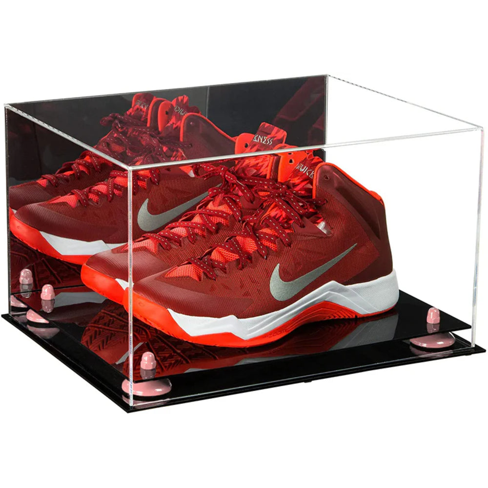 Red Nike basketball shoes in a clear display case on a white background
