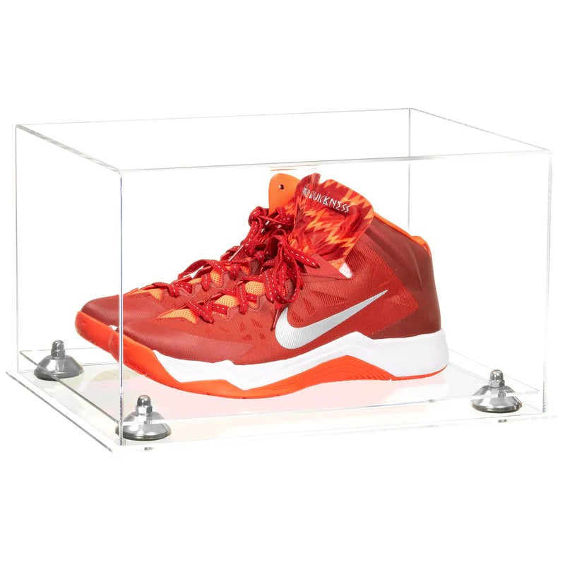 Red and orange sneaker in a clear display case on a white background