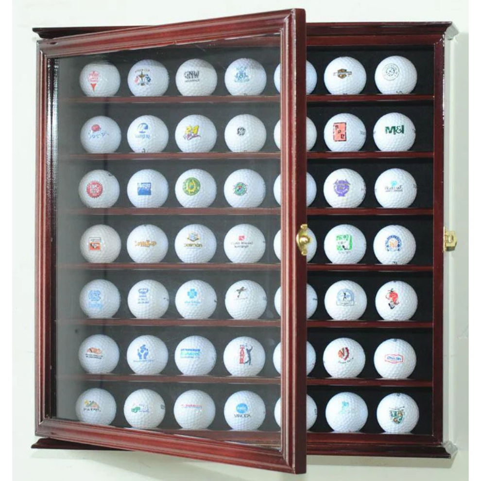 Wooden display cabinet with glass front holding various branded golf balls. Golf ball display case cabinet holder