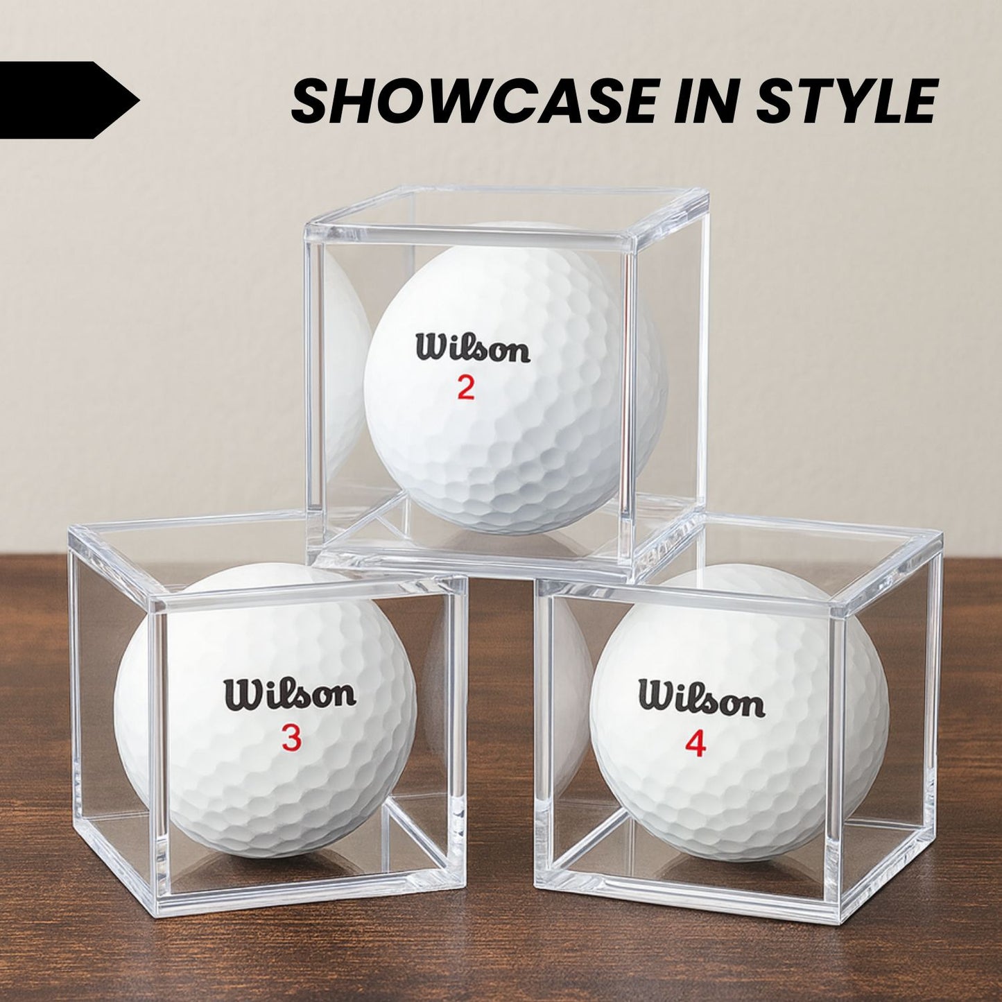 Single golf ball in a clear acrylic cube display case