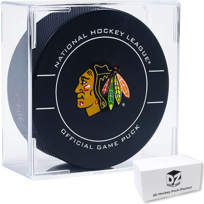 Single hockey puck in a clear acrylic cube display case