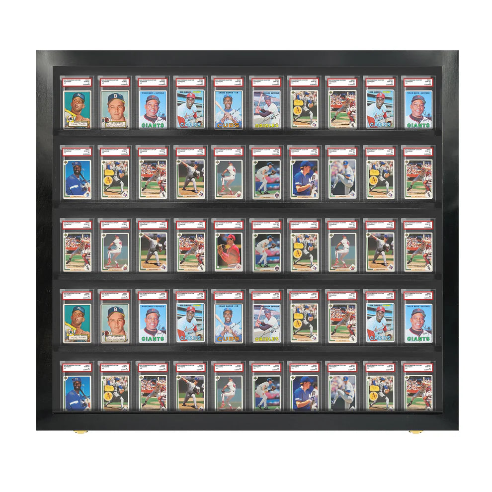 Graded sports trading card slabs arranged in a large black hardwood wall-mounted display cabinet with a clear acrylic front