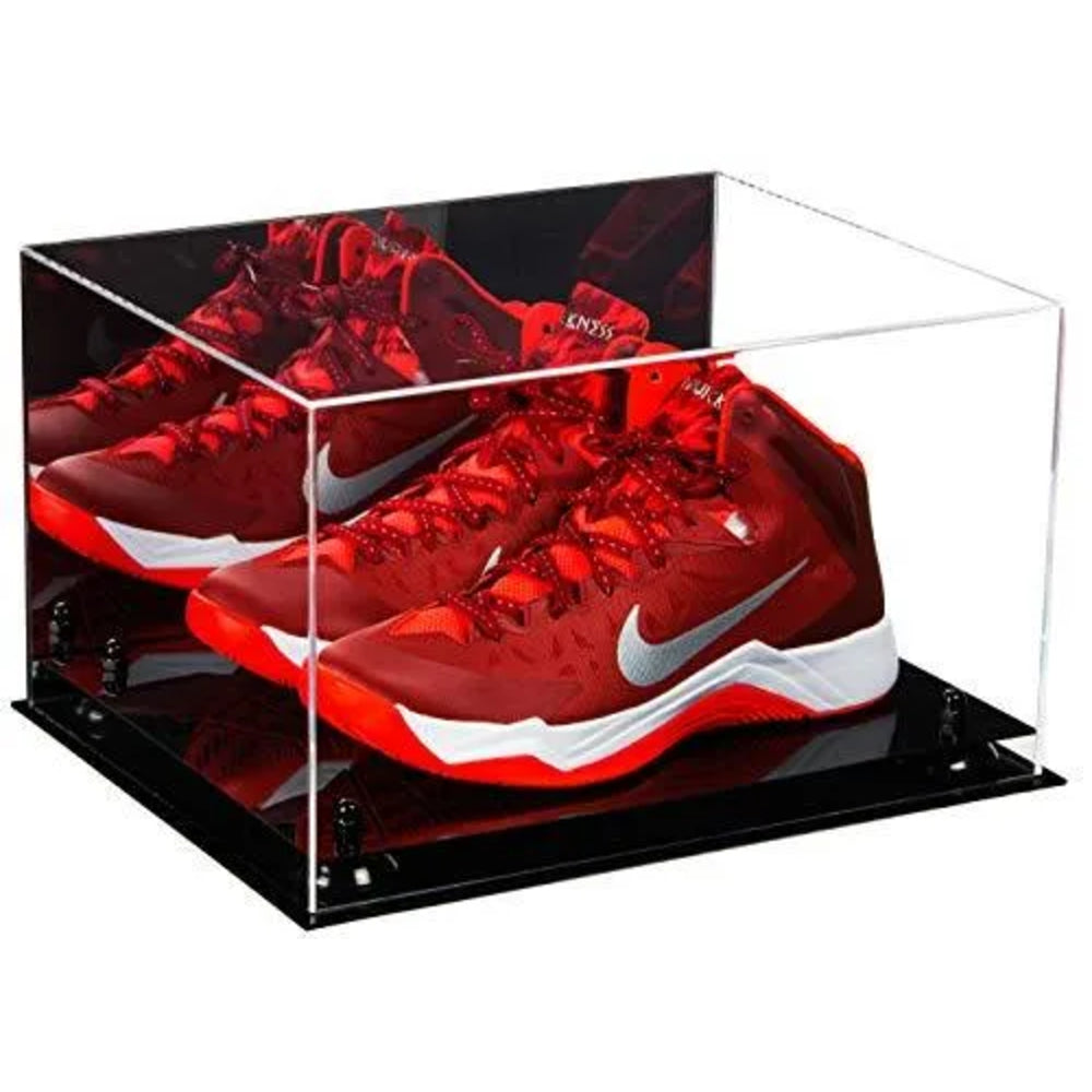 Red sneakers in a clear display case on a white background