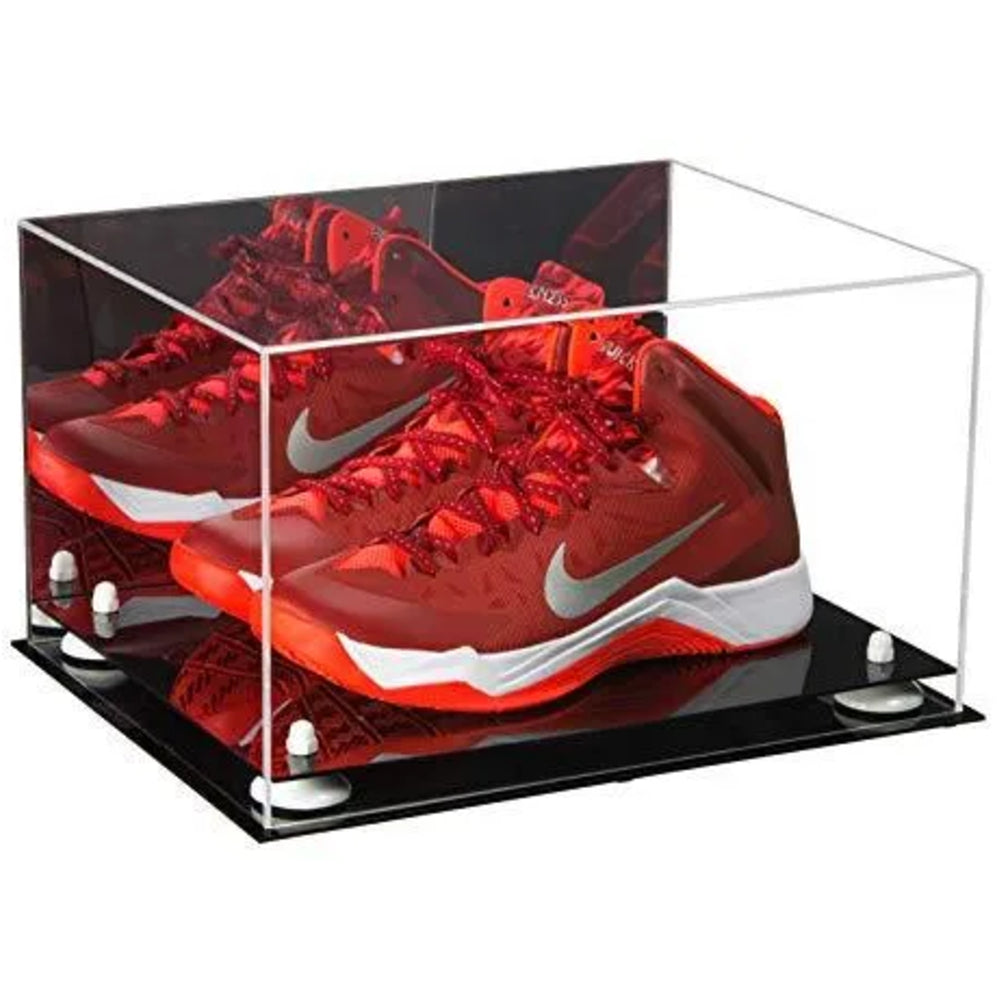 Red sneakers with a Nike logo in a clear display case on a white background
