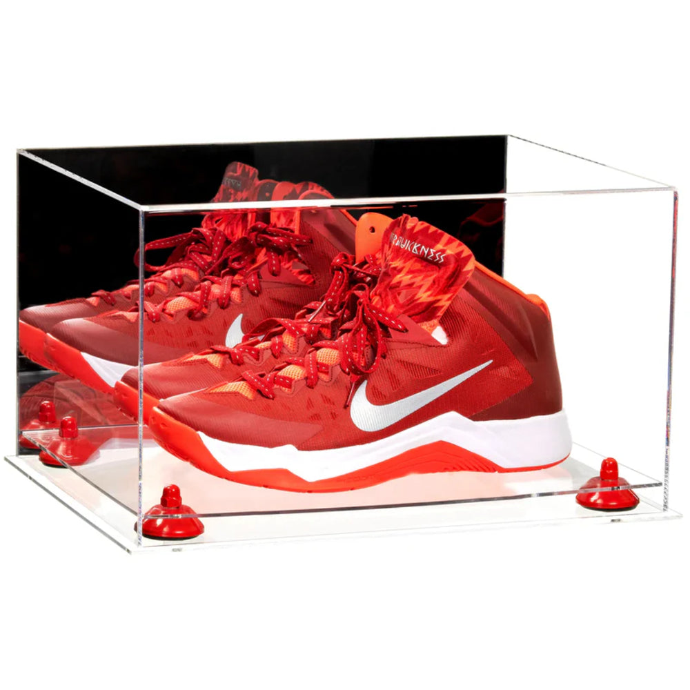 Red sneakers with a white logo in an acrylic display case on a white background