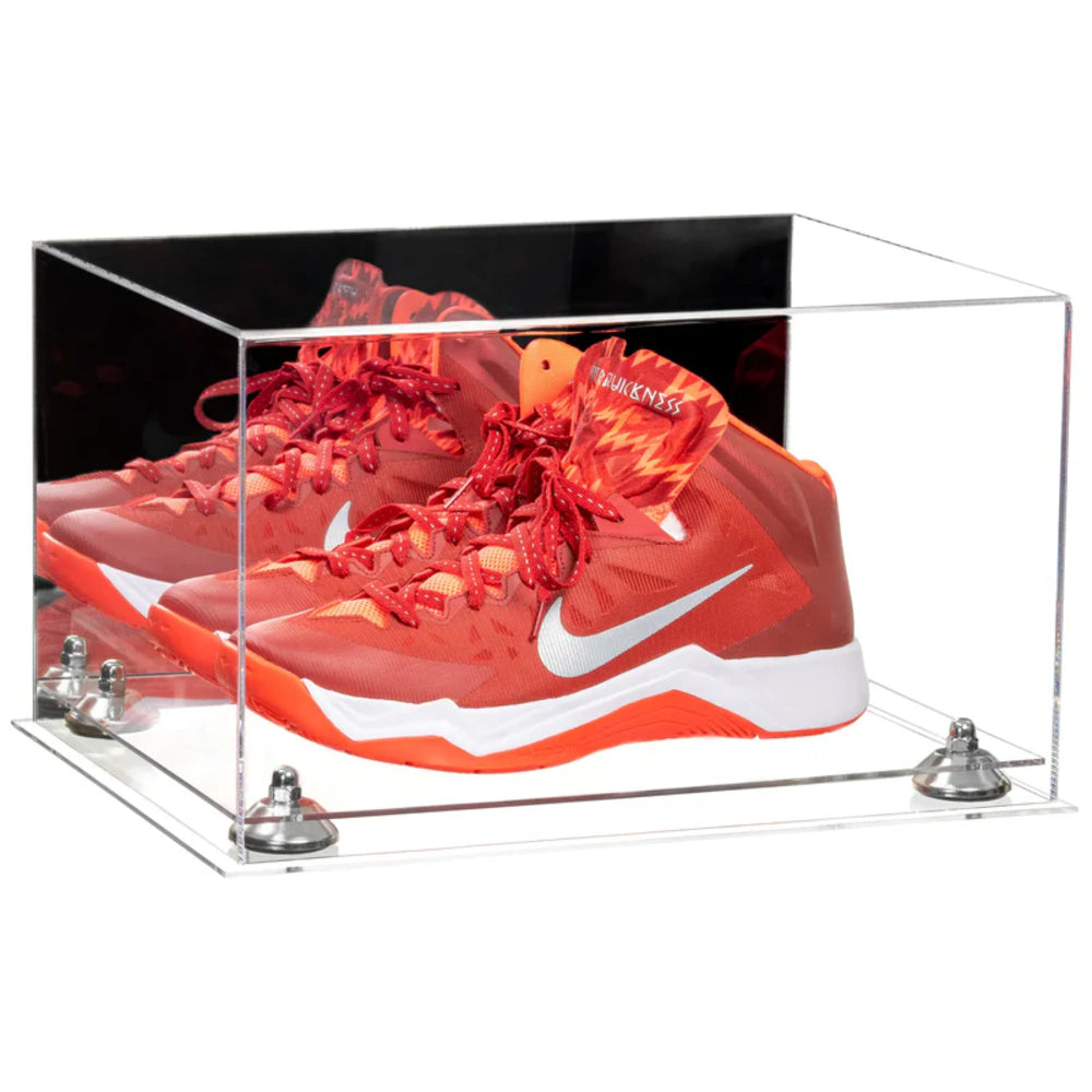 Red Nike sneakers in a clear display case on a white background
