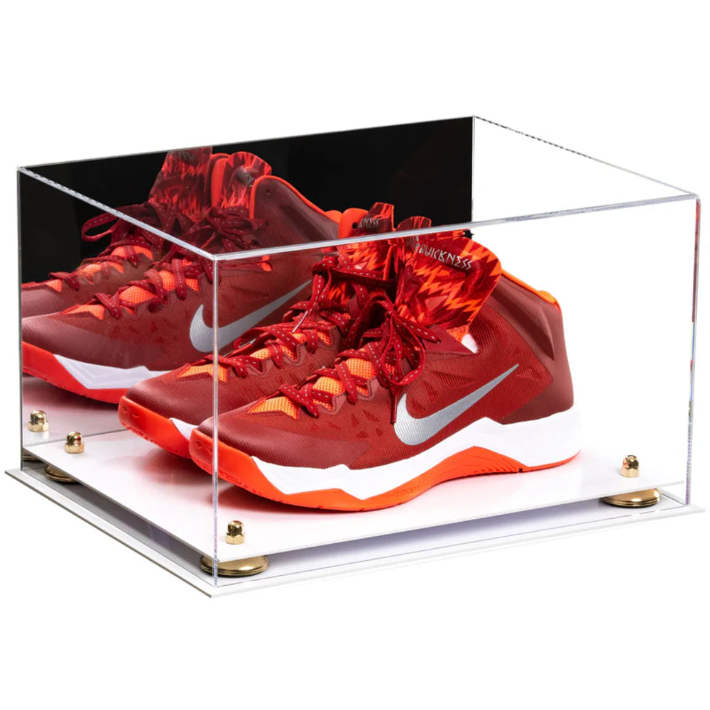 Red sneakers with white swoosh logo in a clear display case on a white background