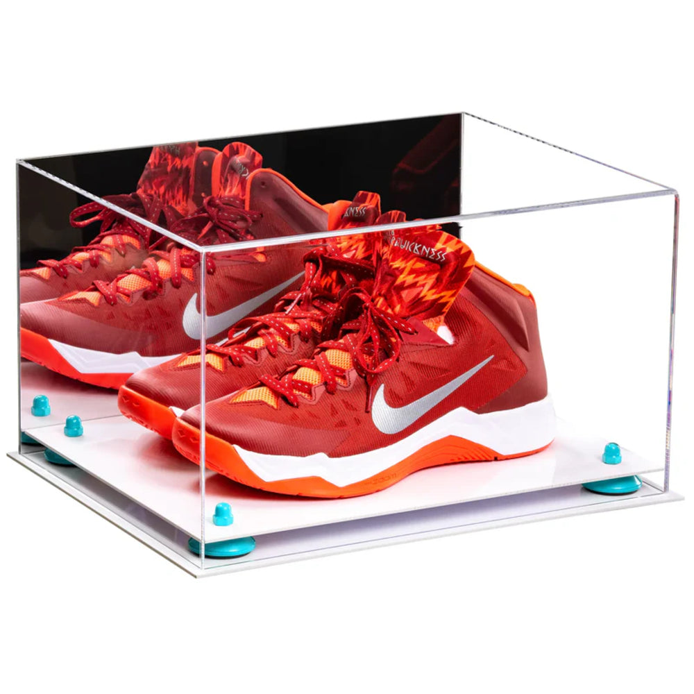 Red Nike sneakers in a clear display case on a white background