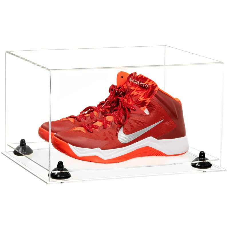 Red and white sneakers in a clear display case on a white background