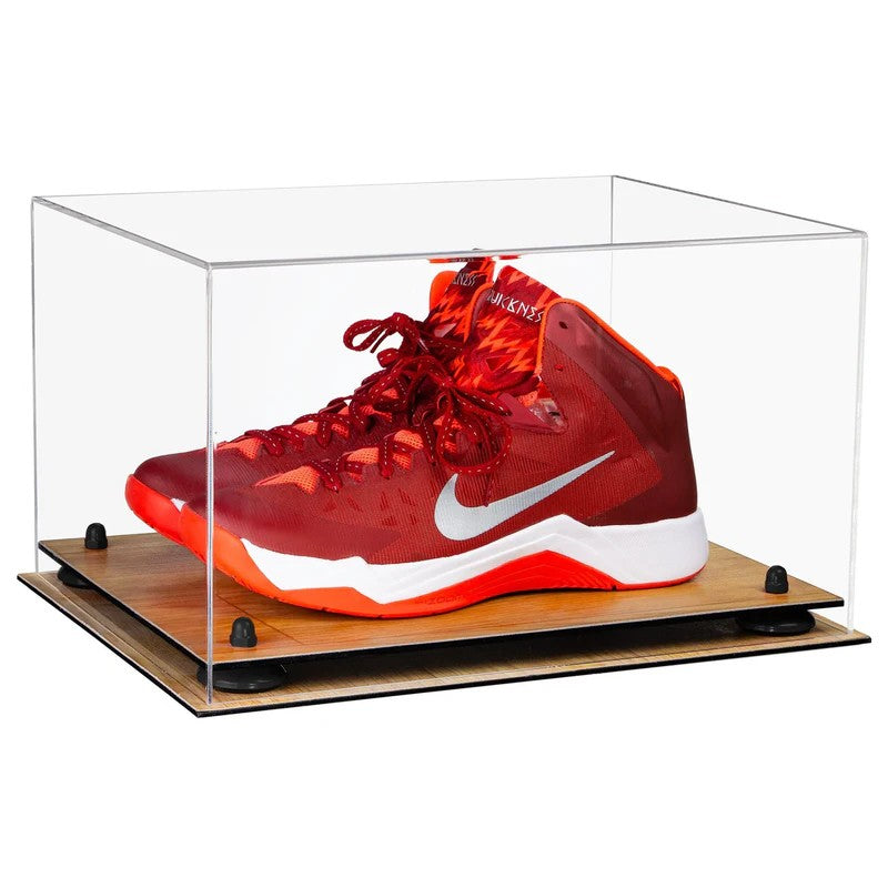 Red sneaker with white swoosh logo in a clear display case on a white background