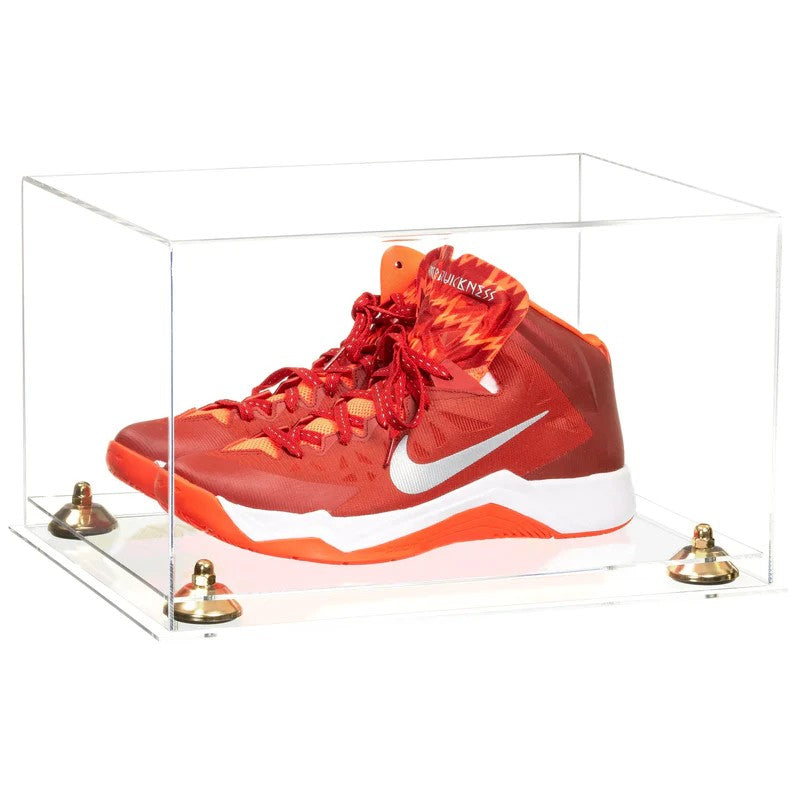 Red and orange sneaker in a clear display case on a white background