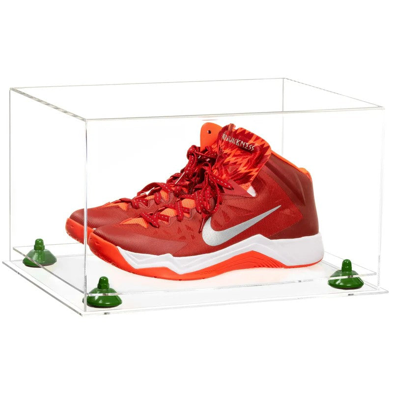 Red Nike basketball shoes in a clear display case on a white background