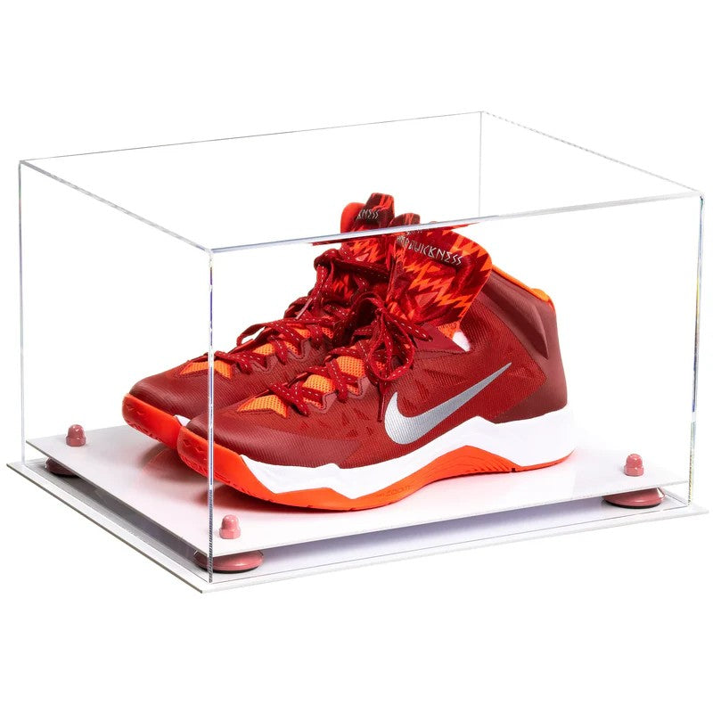 Red and orange sneaker in a clear display case on a white background