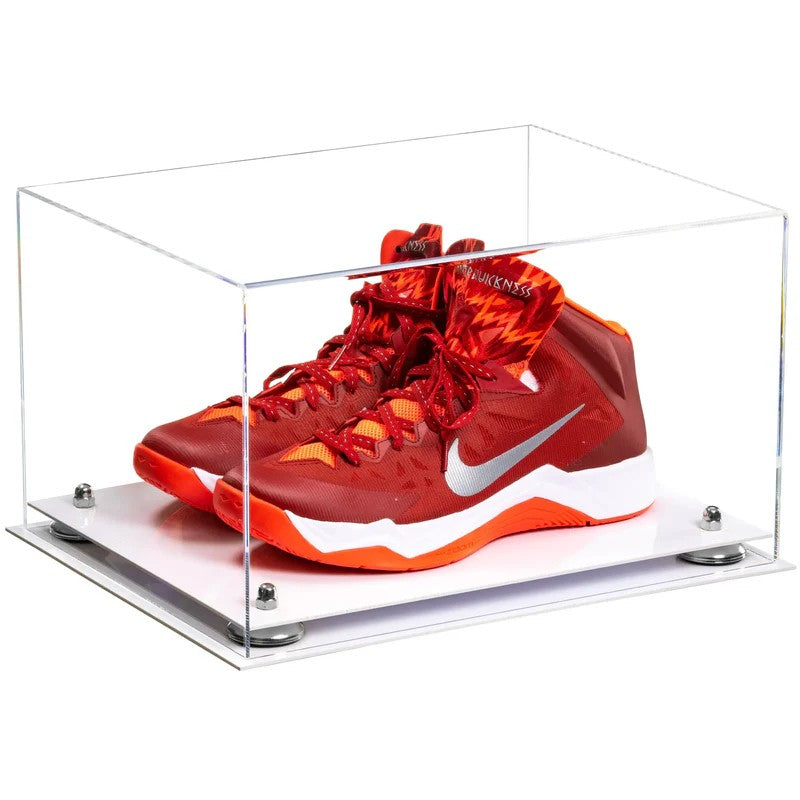 Red and orange sneaker in a clear display case on a white background