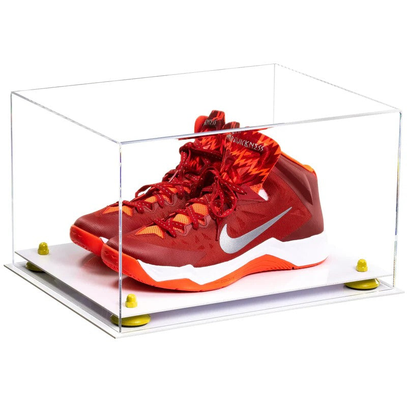Red sneaker with white logo in a clear display case on a white background