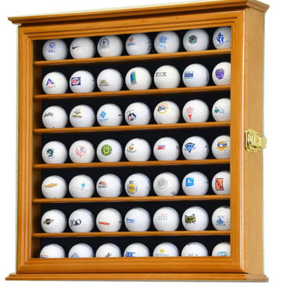 Wooden golf ball display cabinet with various branded golf balls inside. Golf ball display case cabinet holder