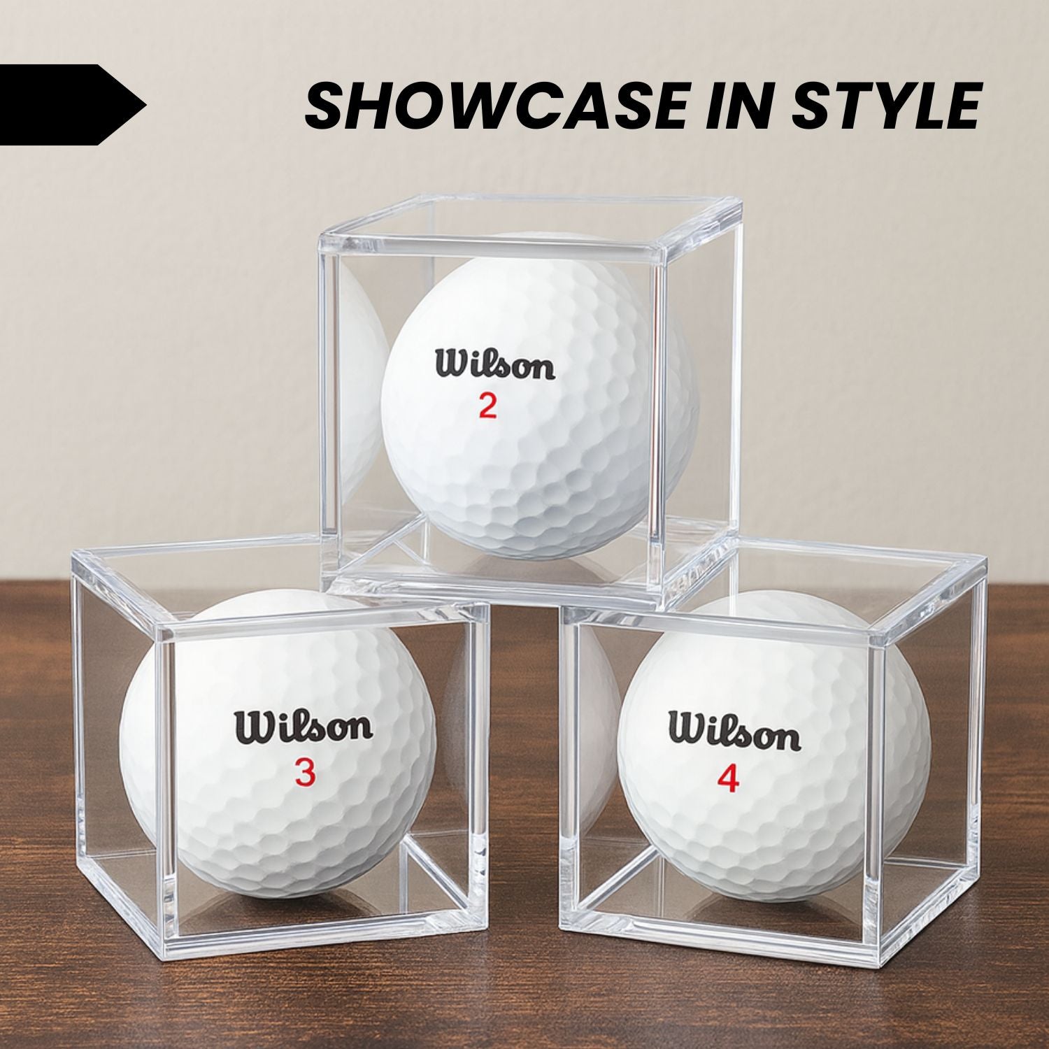 Single golf ball in a clear acrylic cube display case